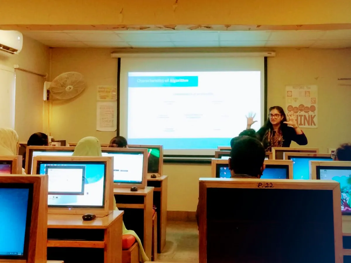 A Technoknowledge trainer leading a session in a school computer lab